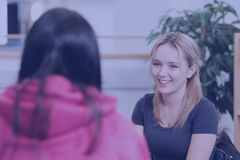 two students talking